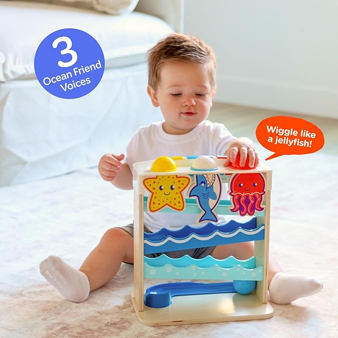 Move2Play, Wooden Ocean Friends | 30+ Fin-Tastic Songs & Phrases | Baby & Toddler Musical Toy | First Birthday Present for 1+ Year Old | Ages 6-24 Months | Boy & Girl Ball Drop Toy